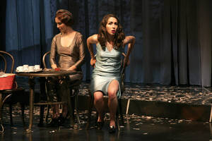 Photograph  35 of Robert Caisley and Lauren 'Lojo' Simon's Performance 'Adoration of Dora: a Play with Text and Images.' Robert Caisley, Associate Professor of Theatre Arts and Head of Dramatic Writing, directed the play. Lauren 'Lojo' Simon, MFA graduate student, wrote the play. Pictured: Cast members perform at dress rehearsal, University of Idaho Hartung Theater.