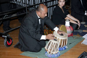 Photograph  10 of Dan Bukvich with Navin Chettri and the Jazz Choir I's Musical Performance 'The Village Sings and Drums and Dances, an evening of engaged voices and rhythms.' Dan Bukvich is Professor of Music. Navin Chettri is Bukvich's student. Pictured: Navin Chettri, University of Idaho Prichard Gallery.