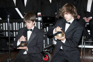Photograph  12 of Dan Bukvich with Navin Chettri and the Jazz Choir I's Musical Performance 'The Village Sings and Drums and Dances, an evening of engaged voices and rhythms.' Dan Bukvich is Professor of Music. Navin Chettri is Bukvich's student. Pictured: Performers from Jazz Choir I, University of Idaho Prichard Gallery.