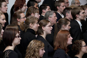 Photograph  16 of Dan Bukvich with Navin Chettri and the Jazz Choir I's Musical Performance 'The Village Sings and Drums and Dances, an evening of engaged voices and rhythms.' Dan Bukvich is Professor of Music. Navin Chettri is Bukvich's student. Pictured: Performers from Jazz Choir I, University of Idaho Prichard Gallery.