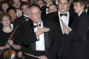 Photograph  22 of Dan Bukvich with Navin Chettri and the Jazz Choir I's Musical Performance 'The Village Sings and Drums and Dances, an evening of engaged voices and rhythms.' Dan Bukvich is Professor of Music. Navin Chettri is Bukvich's student. Pictured: Dan Bukvich and Jazz Choir I, University of Idaho Prichard Gallery.