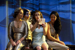 Photograph  43 of Robert Caisley and Lauren 'Lojo' Simon's Performance 'Adoration of Dora: a Play with Text and Images.' Robert Caisley, Associate Professor of Theatre Arts and Head of Dramatic Writing, directed the play. Lauren 'Lojo' Simon, MFA graduate student, wrote the play. Pictured: Cast members perform at dress rehearsal, University of Idaho Hartung Theater.