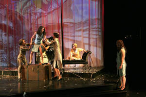 Photograph  46 of Robert Caisley and Lauren 'Lojo' Simon's Performance 'Adoration of Dora: a Play with Text and Images.' Robert Caisley, Associate Professor of Theatre Arts and Head of Dramatic Writing, directed the play. Lauren 'Lojo' Simon, MFA graduate student, wrote the play. Pictured: Cast members perform at dress rehearsal, University of Idaho Hartung Theater.