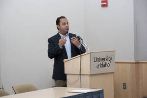 Photograph  4 of Robert Caisley, Marco Deyasi, and Lauren 'Lojo' Simon's Colloquium Panel Discussion 'Art about Art: Collaboration and Expression of Self and Other in Creating New Work for Theatre (on the play "Adoration of Dora").' Robert Caisley is Associate Professor of Theatre Arts and Head of Dramatic Writing. Marco Deyasi is Assistant Professor of Art and Design. Lauren 'Lojo' Simon is a graduate student. Pictured: Marco Deyasi.