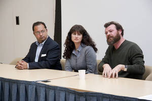 Photograph  10 of Robert Caisley, Marco Deyasi, and Lauren 'Lojo' Simon's Colloquium Panel Discussion 'Art about Art: Collaboration and Expression of Self and Other in Creating New Work for Theatre (on the play "Adoration of Dora").' Robert Caisley is Associate Professor of Theatre Arts and Head of Dramatic Writing. Marco Deyasi is Assistant Professor of Art and Design. Lauren 'Lojo' Simon is a graduate student. Pictured L to R: Deyasi, Simon, and Caisley.