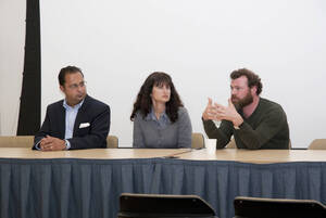 Photograph  11 of Robert Caisley, Marco Deyasi, and Lauren 'Lojo' Simon's Colloquium Panel Discussion 'Art about Art: Collaboration and Expression of Self and Other in Creating New Work for Theatre (on the play "Adoration of Dora").' Robert Caisley is Associate Professor of Theatre Arts and Head of Dramatic Writing. Marco Deyasi is Assistant Professor of Art and Design. Lauren 'Lojo' Simon is a graduate student. Pictured L to R: Deyasi, Simon, and Caisley.