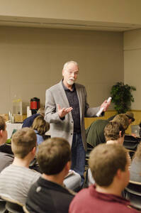 Photograph  1 of Stephen Drown's Colloquium Talk 'The University of Idaho Olmsted Brothers' Master Plan: Historical Process and the Creation of Place.' Stephen Drown is Chair and Professor of Landscape Architecture. Pictured: Rodney Frey introduces Stephen Drown.
