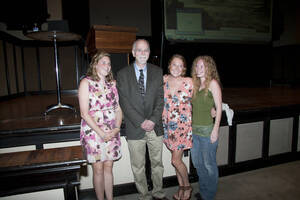 Photograph  14 of Rodney Frey's Keynote Address 'Turning of the Wheel: Meeting the Challenges and Charting - Creating the World with Spokes and a Hub.' Rodney Frey is Professor of Ethnography and Distinguished Humanities Professor. Pictured: Rodney Frey and audience members, Administration Auditorium, UI Moscow.