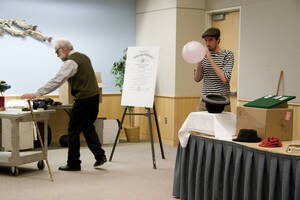 Photograph  20 of Dan Edwards's Colloquium Talk 'The Unique vs. The Universal: the Final Round.' Dan Edwards is Associate Professor of Physical Chemistry. Pictured: Dan Edwards and student assistant.