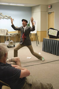 Photograph  4 of Dan Edwards's Colloquium Talk 'The Unique vs. The Universal: the Final Round.' Dan Edwards is Associate Professor of Physical Chemistry. Pictured: Student assistant to Dan Edwards.
