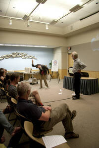 Photograph  5 of Dan Edwards's Colloquium Talk 'The Unique vs. The Universal: the Final Round.' Dan Edwards is Associate Professor of Physical Chemistry. Pictured: Dan Edwards and student assistant.