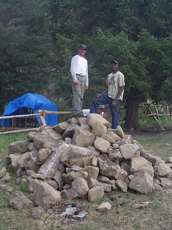 CNR students Craig Holmberg and Hati Mvundura (from Zimbabwe) show what had to be dug out of foundation holes.