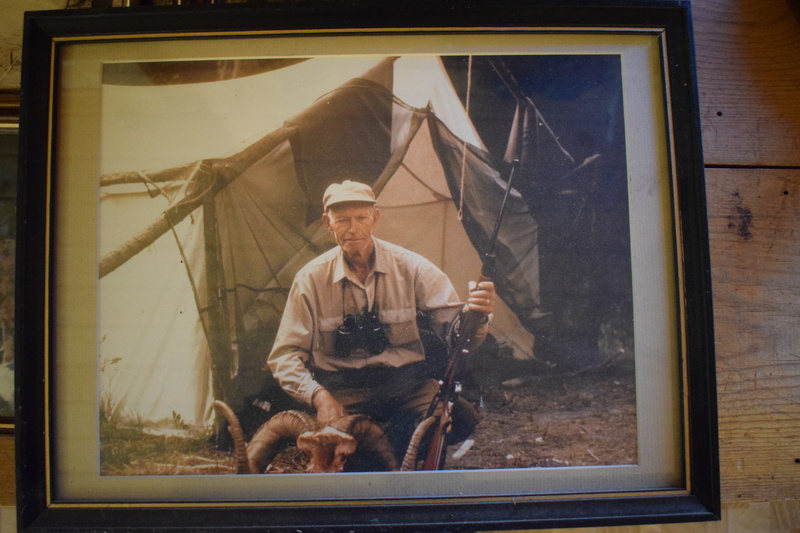 Jess Taylor on a hunting trip with a bighorn sheep kill.