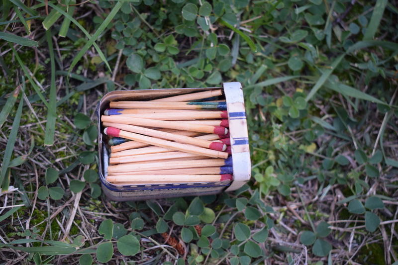 This is a tin epsom salt box full of matches that belonged to W.H. Bolles.