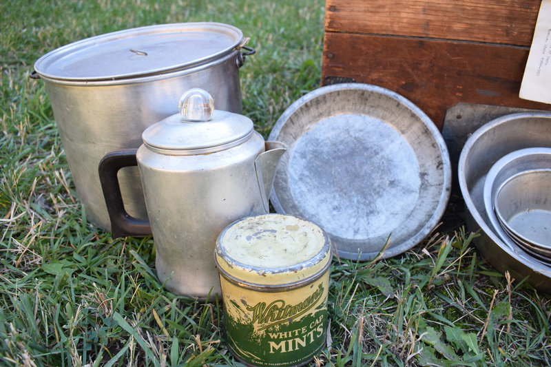 W.H. Bolles Cooking Trunk. In the days before gasoline drums, gasoline was sold in 5-gallon cans, two cans to a wooden box, for use in areas remote from service stations. These boxes were in common use among horse campers for carrying "the kitchen", as it was known. They fitted nicely into canvas pack saddle bags known as an alforjas (Spanish name) which were suspended from the pack saddle by leather loops. I reinforced them with metal strips, added covers and locks and used them when horse camping in Idaho, Wyoming, Washington, and Oregon. The nest of aluminum kettles, cast iron frying pan, break proof egg carton and other items were very useful to horse campers of that bygone era. These items are being sent to the Taylor Ranch for display among their archives.