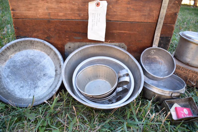 W.H. Bolles Cooking Trunk. In the days before gasoline drums, gasoline was sold in 5-gallon cans, two cans to a wooden box, for use in areas remote from service stations. These boxes were in common use among horse campers for carrying "the kitchen", as it was known. They fitted nicely into canvas pack saddle bags known as an alforjas (Spanish name) which were suspended from the pack saddle by leather loops. I reinforced them with metal strips, added covers and locks and used them when horse camping in Idaho, Wyoming, Washington, and Oregon. The nest of aluminum kettles, cast iron frying pan, break proof egg carton and other items were very useful to horse campers of that bygone era. These items are being sent to the Taylor Ranch for display among their archives.