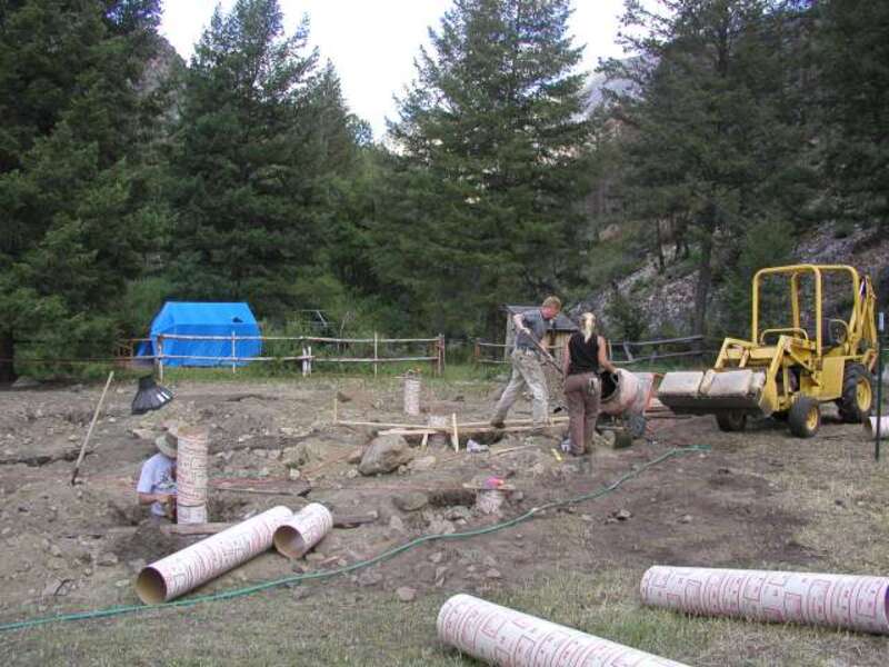 Three interns learning how to build the foundation.