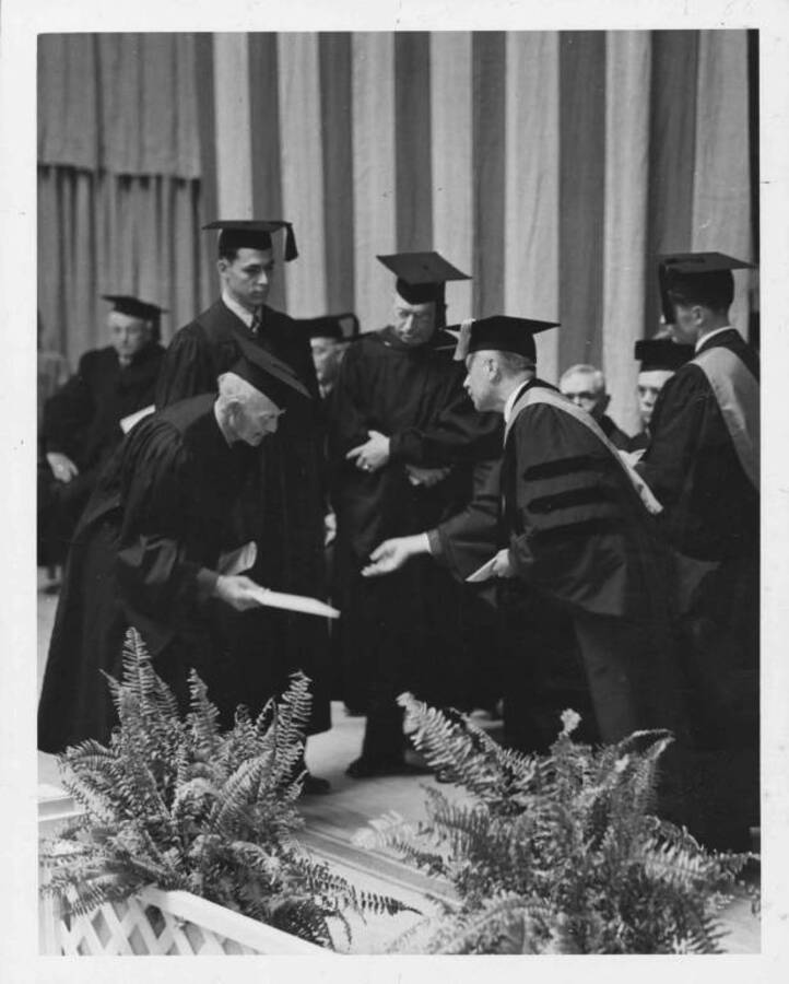 John Brigham receiving honorary degree.