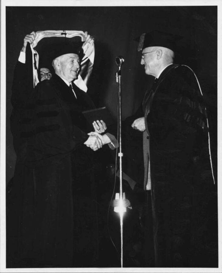 Carl G. Paulsen receiving honorary Dr. Science degree.