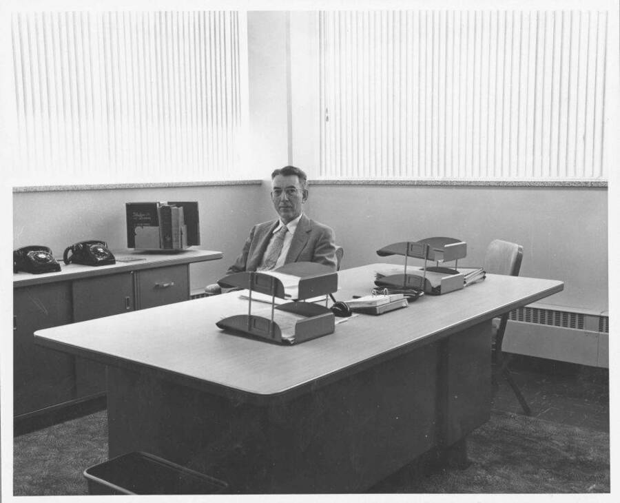 University of Idaho Librarian (1948 - 1967), in office of new library building (1958). Portrait.