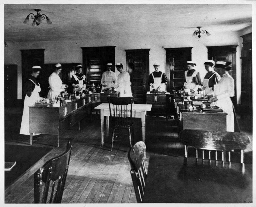 Students during a cooking class for Home Economics in Ridenbaugh Hall.