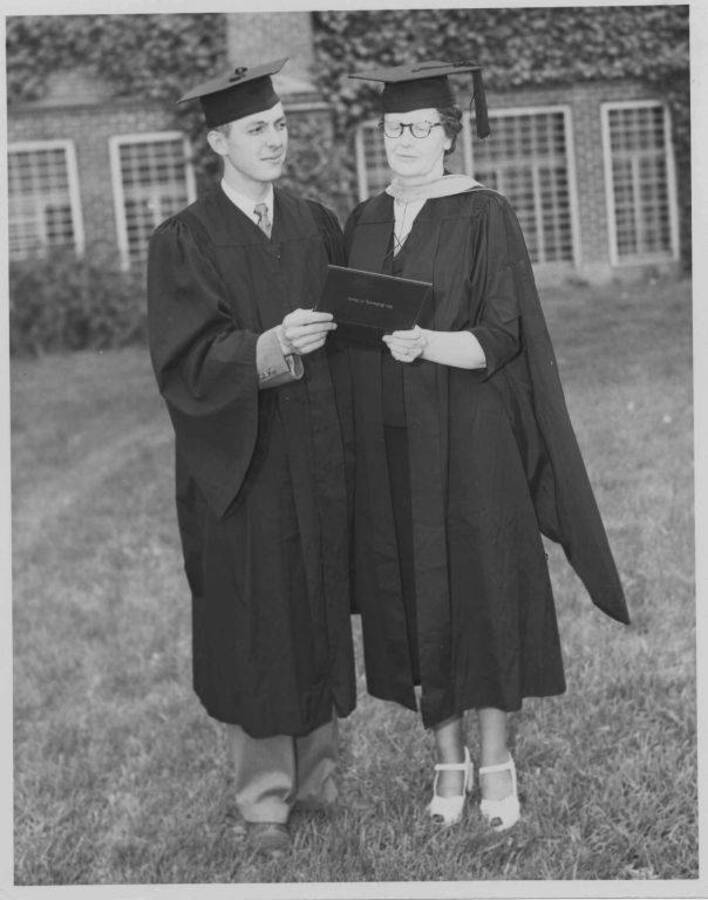 Mrs. Maude Cosho Houston, member of Board of Regents, with son John who received a BS degree.