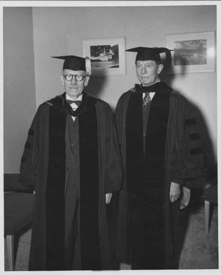 Idaho's first two Rhodes Scholars, Laurence Gipson and Carol Howe Foster, receiving Doctorate degrees.