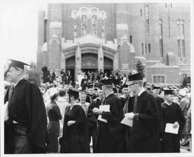 Parents and friends congratulate the seniors after commencement outside Memorial Gym.