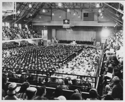 Graduates and audience inside the Memorial Gym.