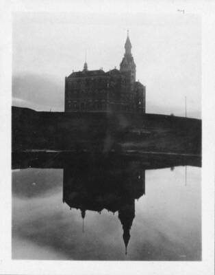 Administration Building shown against a reflecting pond.