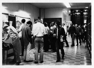 Students congregating in hallway.