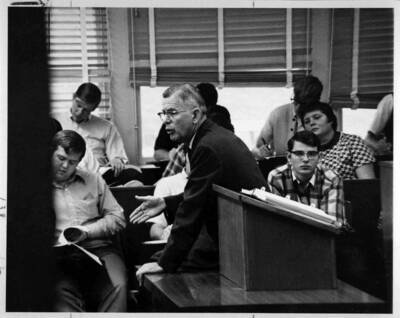 Dean Albert R. Menard teaching during class in the College of Law.
