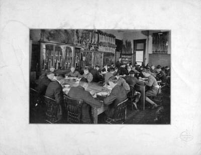 Student during an Agronomy Lab section, early 1900's American Engraving Co., Spokane.