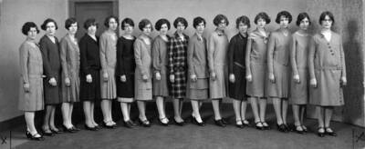 Seniors in dresses made in class.