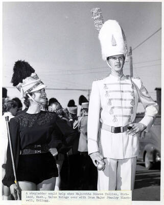 Marjorette Bonse Collins and Drum Jaor Stanley Blackwell wait during Homecoming parade. Donor: Publications Department.