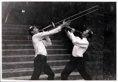 Pep Band members posing with instruments.
