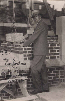 Laying cornerstone for Memorial Gymnasium by States Legion Commander Lonergan.
