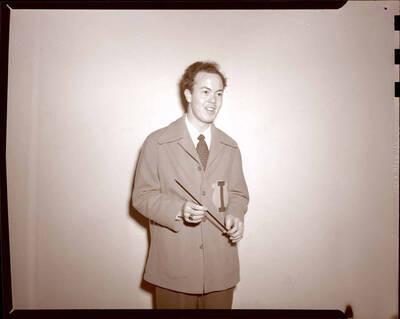Unidentified conductor for a university band.