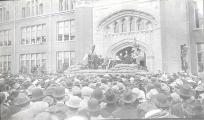 Theodore Roosevelt on platform in front of University of Idaho Administration Building.