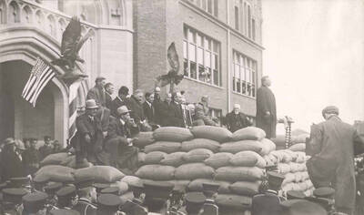 Theodore Roosevelt on platform in front of University of Idaho Administration Building.