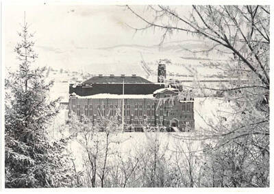 Memorial Gymnasium during winter on the University of Idaho campus.