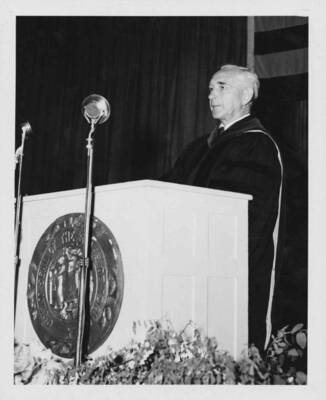 Dr. Adam S. Bennion of Salt Lake City, Utah, speaking at commencement. He told University of Idaho graduates at that they live in the last great refuge of free men, and must meet two challenges - of Communism, of Socialism.