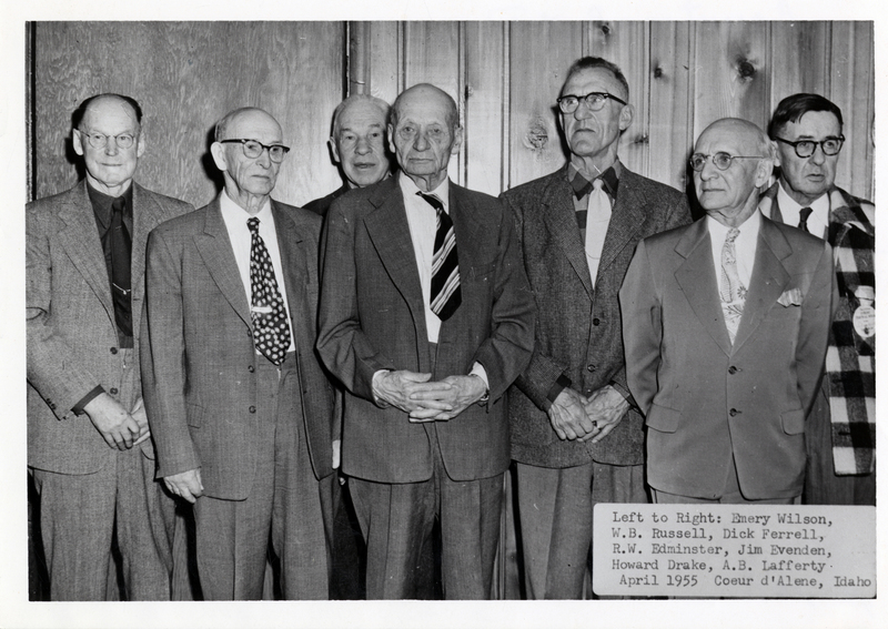 Seven men dressed in suits pose for a picture together.The men are left to right: Emery Wilson, W alter B. Russell, Richard 'Dick' Ferrell, R.W. Edminster, Jim Evenden, Howard Drake, and A.B. Lafferty. Taken in April.