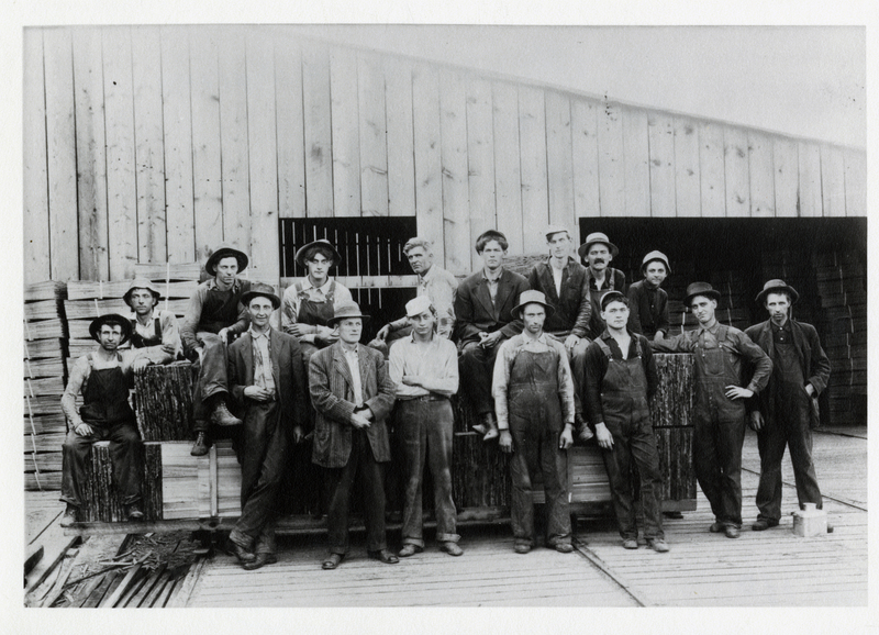 Day crew posing for a picture at Stine Lumber & Shingle Company in St. Maries, Idaho.The company manufactured only shingles. James (Jim) D. Miller was the  owner and manager, bareheaded in the back row. Courtesy of Glen Miller, his son.