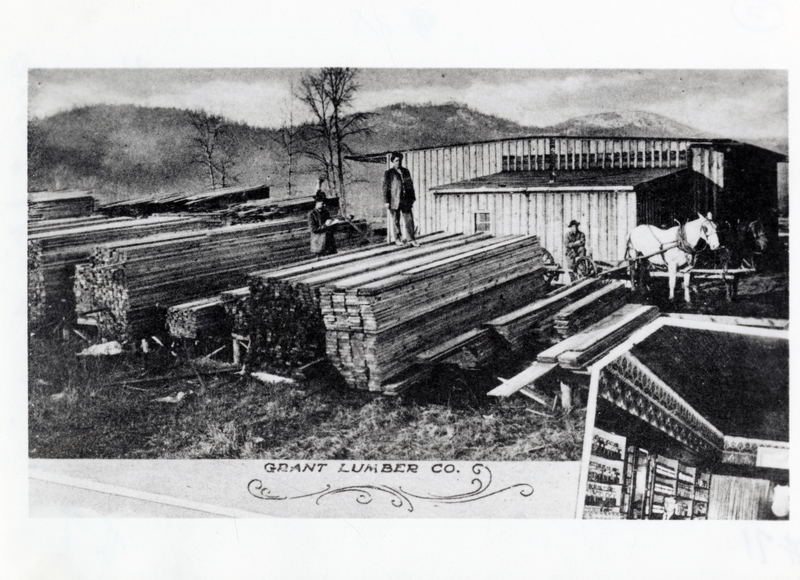 View of employees working at the lumber yard at Grant Lumber Company, St. Maries, Idaho (misidentified as C.W. Russell Sawmill in White Pine King of Many Waters). From Souvenir of St. Maries by Straffin and Day (1911).