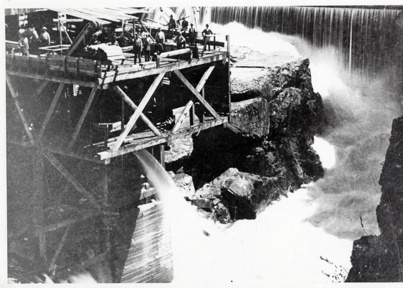 Pictured is the Frederick Post's first water-powered sawmill and employees, Post Falls, Idaho. Courtesy Paul M. Elder.