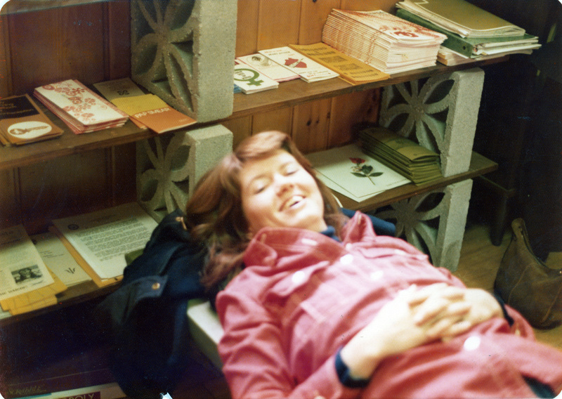 A person lying down in the Women's Center.
