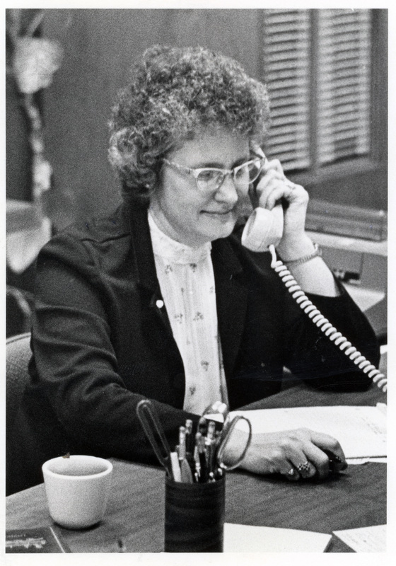 Evelyn McGraw, who worked in the College of Letters and Science, speaking on the phone.