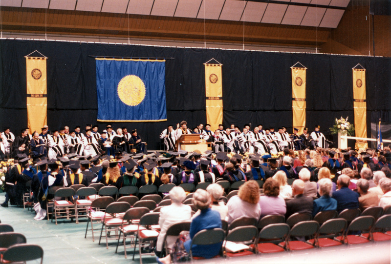 Scene during Elisabeth Zinser's inauguration. Zinser was the first female president of the University of Idaho. She is possibly the speaker standing at the podium.