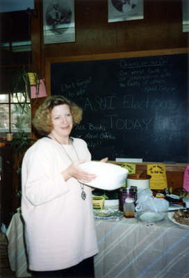 Jill Anderson holding a casserole dish